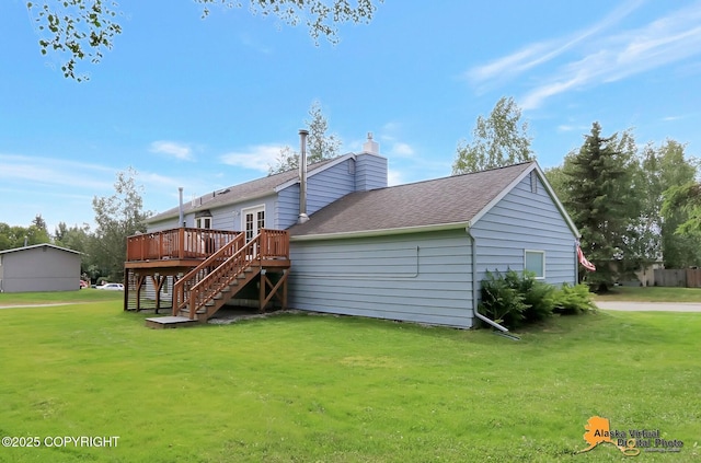 8461 Greenhill Way, Anchorage, AK 99502 - rear view of house with stairway, a deck, a yard, a shingled roof, and a chimney