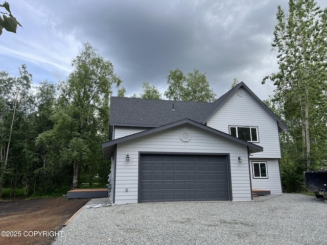 3271 N Bald Eagle Dr, Wasilla, AK 99654 - view of front facade featuring driveway and roof with shingles
