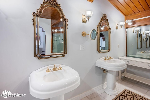 2107 Sorbus Way, Anchorage, AK 99508 - bathroom featuring tile patterned floors, two sinks, and wooden ceiling