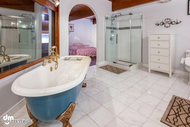 2107 Sorbus Way, Anchorage, AK 99508 - full bath with a stall shower, a soaking tub, ensuite bath, and tile patterned flooring