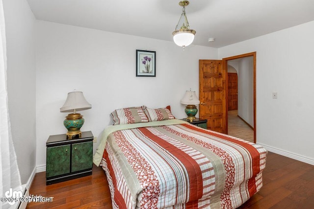 2107 Sorbus Way, Anchorage, AK 99508 - bedroom featuring wood finished floors and baseboards