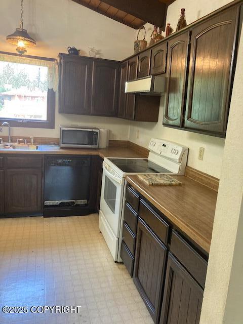 2531 W 79th Ave, Anchorage, AK 99502 - kitchen with dishwasher, white electric range, under cabinet range hood, stainless steel microwave, and dark countertops