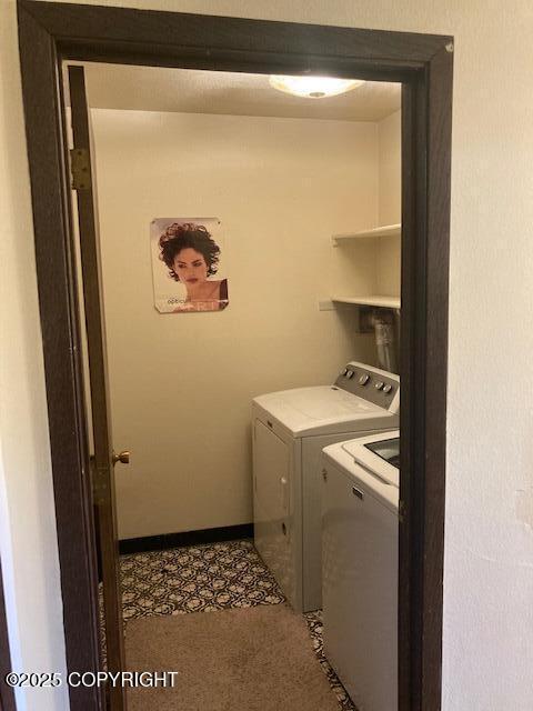 2531 W 79th Ave, Anchorage, AK 99502 - laundry room with separate washer and dryer and baseboards