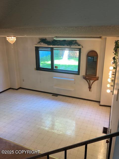 2531 W 79th Ave, Anchorage, AK 99502 - empty room with light floors