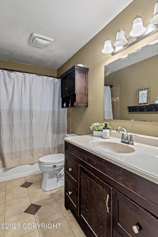 1119 Alder Ave, Kenai, AK 99611 - bathroom featuring vanity, tile patterned floors, and a shower with shower curtain