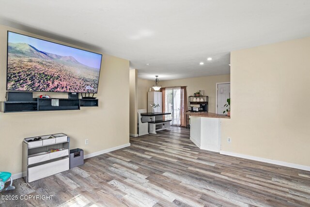 1119 Alder Ave, Kenai, AK 99611 - living room featuring wood finished floors and recessed lighting