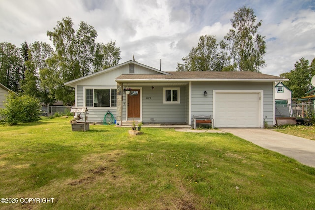 1119 Alder Ave, Kenai, AK 99611 - view of front of home with a garage and concrete driveway