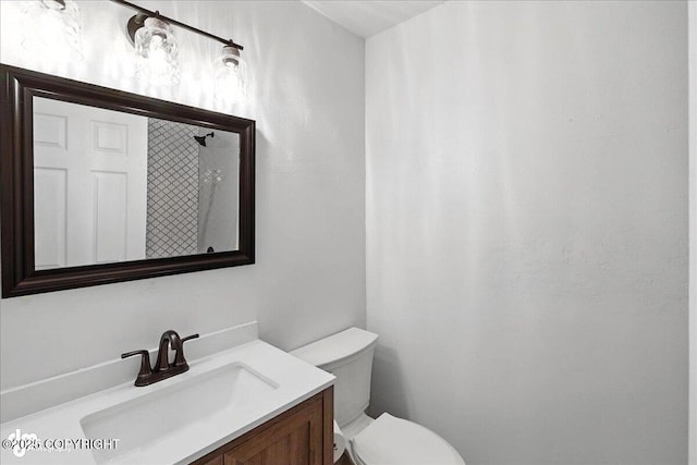 173 W Corral Ave, Soldotna, AK 99669 - bathroom featuring toilet and vanity