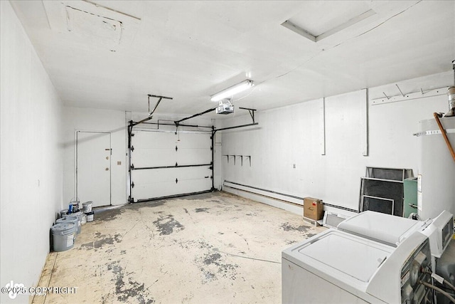 173 W Corral Ave, Soldotna, AK 99669 - garage featuring washing machine and dryer, a garage door opener, and gas water heater