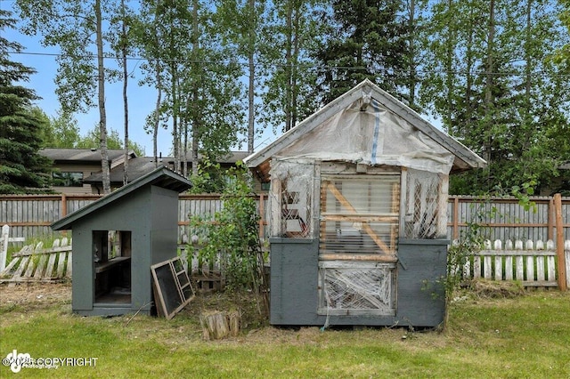173 W Corral Ave, Soldotna, AK 99669 - view of greenhouse with a fenced backyard