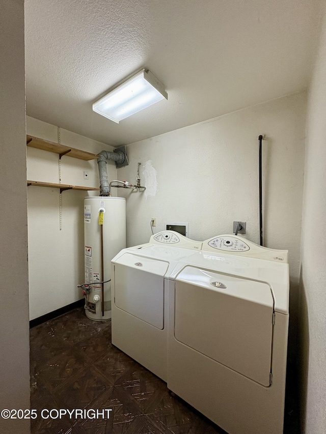 8204 E 17th Ave, Anchorage, AK 99504 - laundry area with water heater, washer and dryer, and a textured ceiling