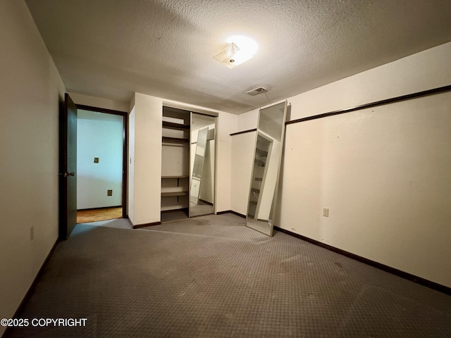 8204 E 17th Ave, Anchorage, AK 99504 - unfurnished bedroom with carpet flooring and a textured ceiling