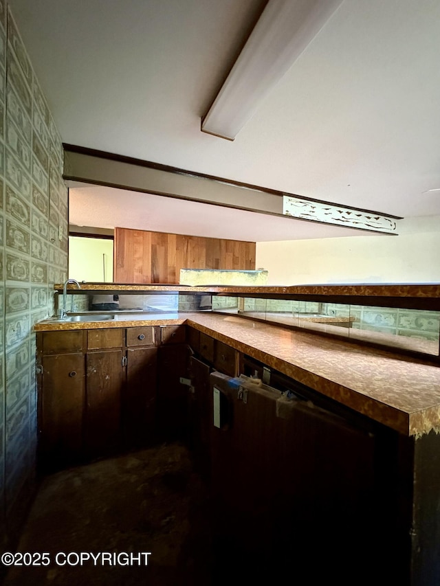 8204 E 17th Ave, Anchorage, AK 99504 - kitchen featuring wallpapered walls and black dishwasher