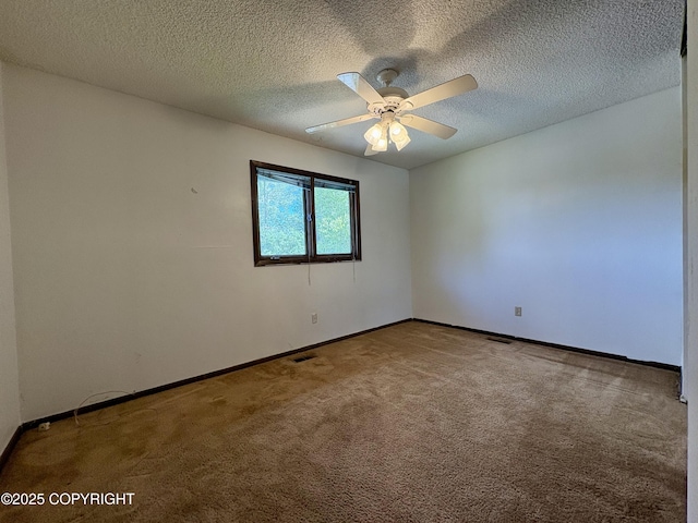 8204 E 17th Ave, Anchorage, AK 99504 - carpeted spare room with a ceiling fan and a textured ceiling
