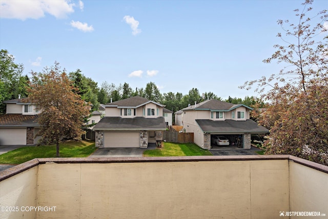 369 Breeze Ct # 13, Anchorage, AK 99515 - traditional-style home with asphalt driveway, stone siding, an attached garage, and a residential view
