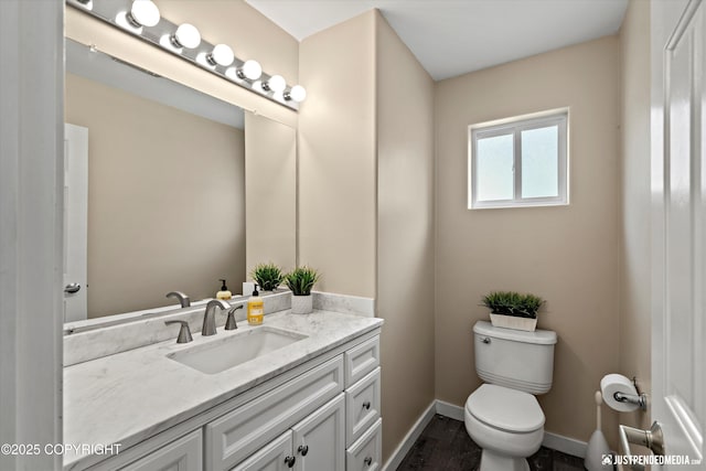 369 Breeze Ct # 13, Anchorage, AK 99515 - half bath featuring vanity and wood finished floors
