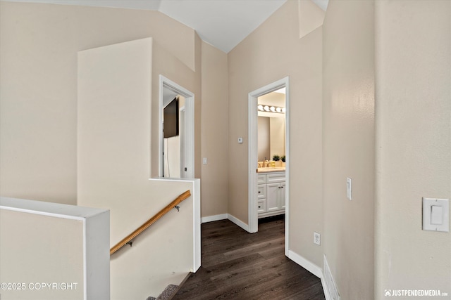 369 Breeze Ct # 13, Anchorage, AK 99515 - corridor with dark wood-type flooring and baseboards