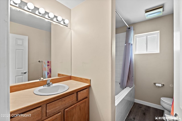 369 Breeze Ct # 13, Anchorage, AK 99515 - bathroom featuring vanity, shower / tub combo, and wood finished floors