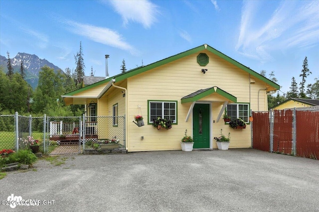 16720 E Maud Rd, Palmer, AK 99645 - bungalow-style house with a mountain view and a gate