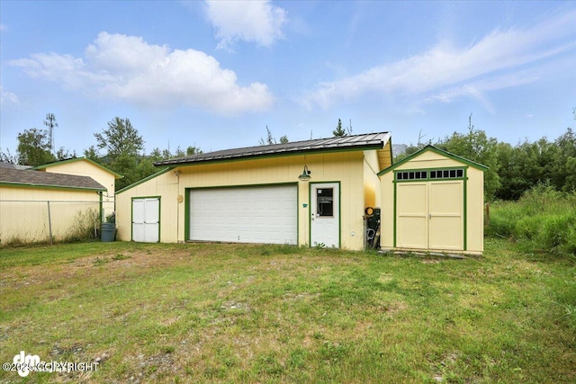 16720 E Maud Rd, Palmer, AK 99645 - detached garage featuring a storage unit