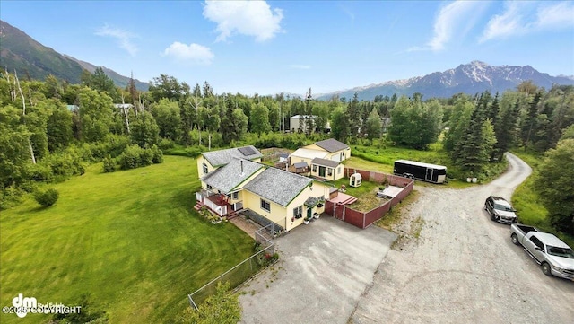 16720 E Maud Rd, Palmer, AK 99645 - aerial view of property and surrounding area with mountains and a forest