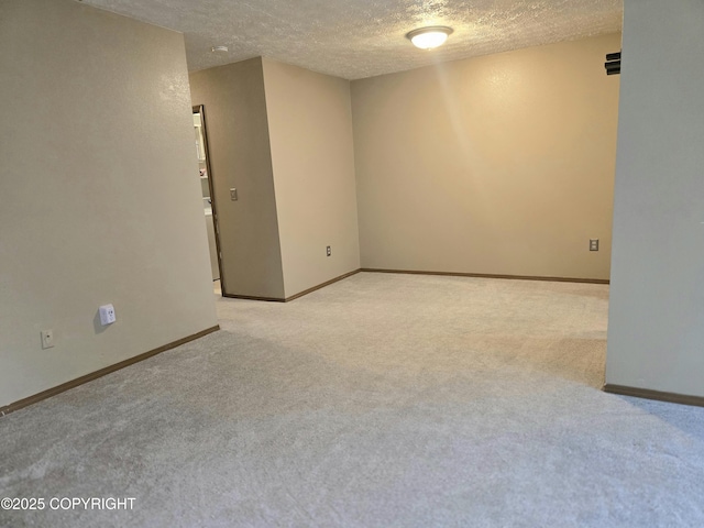 1120 China Berry Cir, Anchorage, AK 99515 - unfurnished room with light carpet and a textured ceiling