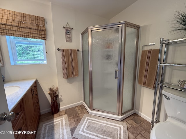 2008 Bickford Cir, Seldovia, AK 99663 - full bathroom featuring a shower stall, vanity, and stone finish floors