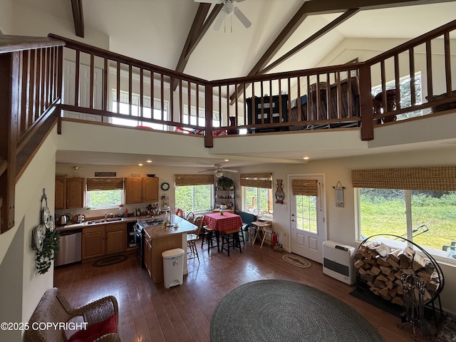 2008 Bickford Cir, Seldovia, AK 99663 - kitchen with a ceiling fan, dishwasher, heating unit, healthy amount of natural light, and high vaulted ceiling