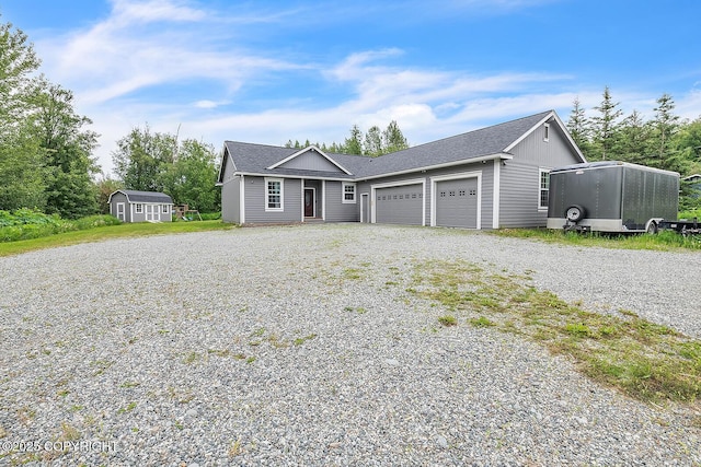 5305 N Caprice Dr, Palmer, AK 99645 - single story home featuring a garage, driveway, and a shed