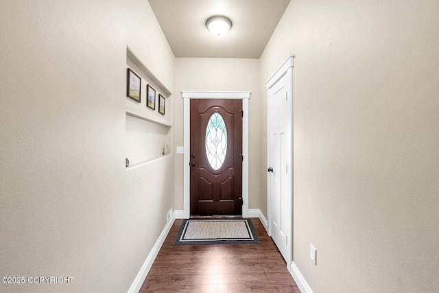5305 N Caprice Dr, Palmer, AK 99645 - entryway featuring dark wood-style flooring and baseboards