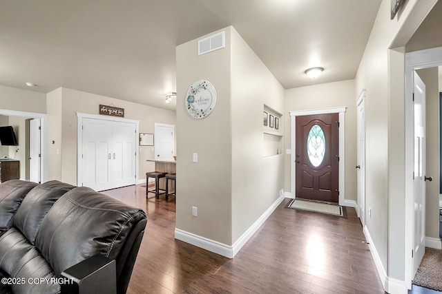 5305 N Caprice Dr, Palmer, AK 99645 - entryway featuring dark wood-type flooring and baseboards