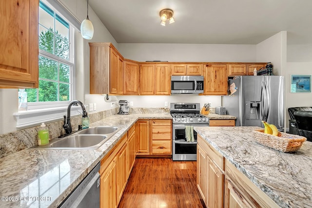 5305 N Caprice Dr, Palmer, AK 99645 - kitchen featuring stainless steel appliances, wood finished floors, pendant lighting, and light stone counters
