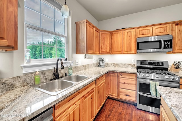 5305 N Caprice Dr, Palmer, AK 99645 - kitchen featuring stainless steel appliances, dark wood finished floors, hanging light fixtures, and light stone countertops