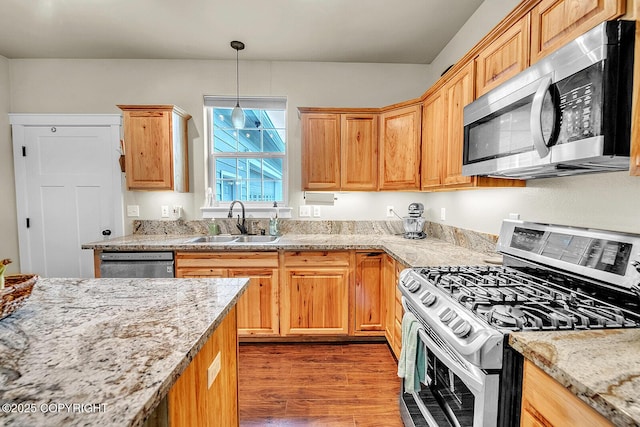 5305 N Caprice Dr, Palmer, AK 99645 - kitchen with stainless steel appliances, wood finished floors, and pendant lighting