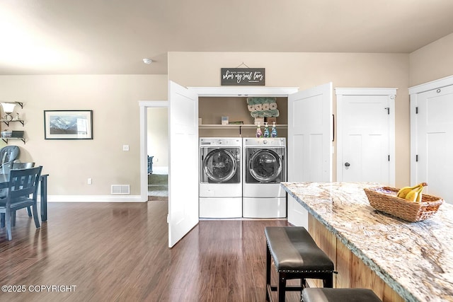 5305 N Caprice Dr, Palmer, AK 99645 - laundry area featuring washing machine and clothes dryer and dark wood-type flooring