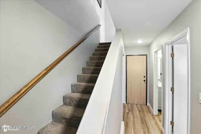3601 Oregon Dr # 1, Anchorage, AK 99517 - stairs featuring wood finished floors