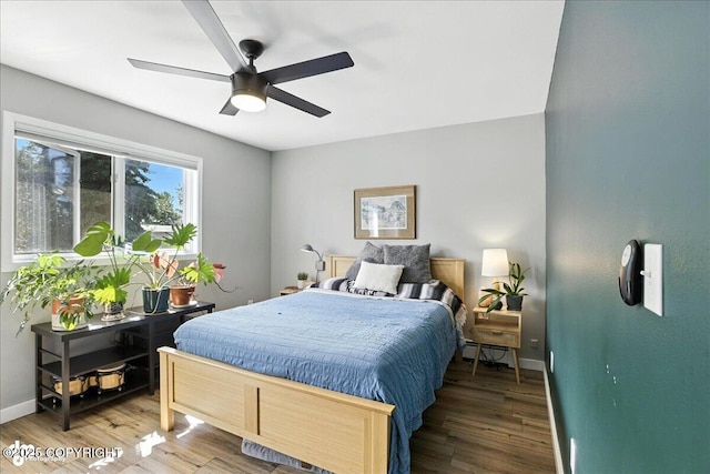 3601 Oregon Dr # 1, Anchorage, AK 99517 - bedroom featuring wood finished floors and a ceiling fan