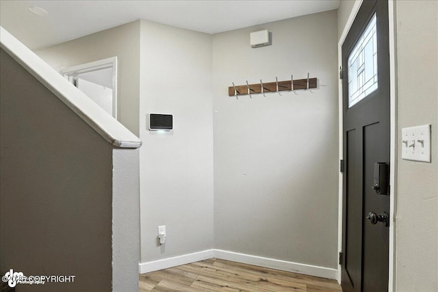 3601 Oregon Dr # 1, Anchorage, AK 99517 - hallway with light wood-type flooring and baseboards
