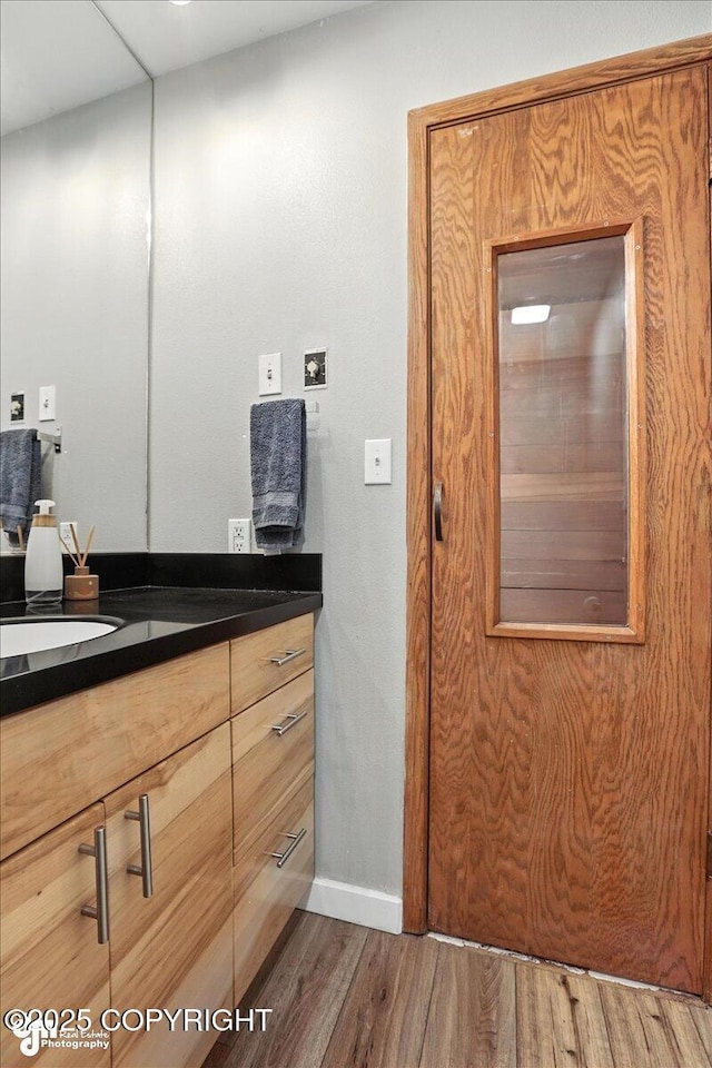 3601 Oregon Dr # 1, Anchorage, AK 99517 - bathroom with wood finished floors and vanity
