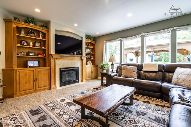 17237 E Smith Rd, Palmer, AK 99645 - living area with light colored carpet, a fireplace, and recessed lighting