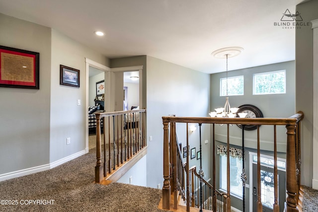 17237 E Smith Rd, Palmer, AK 99645 - hall with an upstairs landing, a chandelier, carpet, and recessed lighting