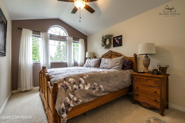 17237 E Smith Rd, Palmer, AK 99645 - bedroom with light carpet, lofted ceiling, and a ceiling fan