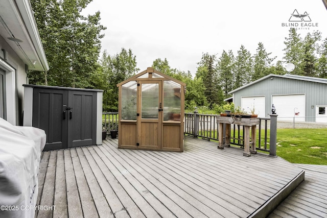 17237 E Smith Rd, Palmer, AK 99645 - deck featuring an outbuilding, a detached garage, a greenhouse, and a yard