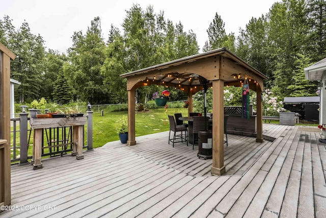 17237 E Smith Rd, Palmer, AK 99645 - deck with a fenced backyard, a gazebo, and view of wooded area