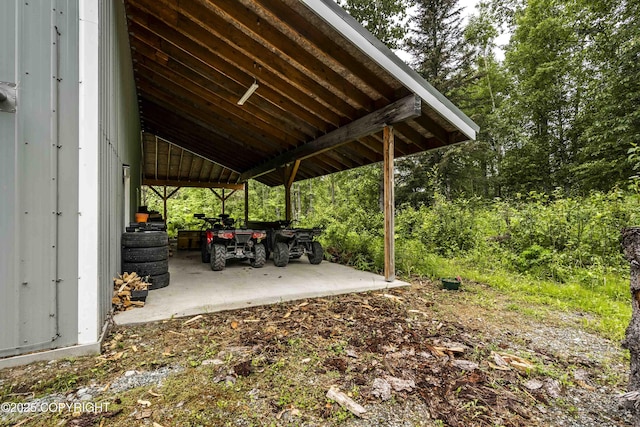 17237 E Smith Rd, Palmer, AK 99645 - view of patio / terrace featuring an attached carport