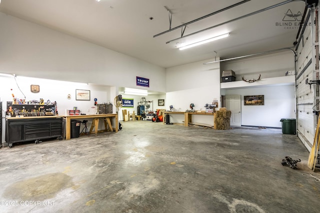 17237 E Smith Rd, Palmer, AK 99645 - garage featuring a workshop area