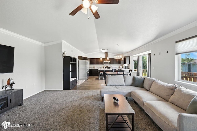 3098 N Lazy Aurora Cir, Palmer, AK 99645 - living area featuring healthy amount of natural light, ceiling fan, lofted ceiling, ornamental molding, and light colored carpet