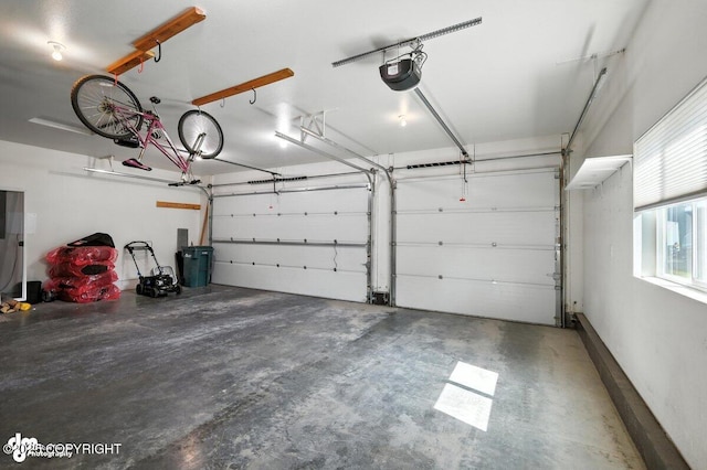 3098 N Lazy Aurora Cir, Palmer, AK 99645 - garage featuring a garage door opener