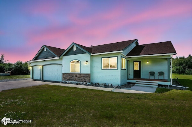 3098 N Lazy Aurora Cir, Palmer, AK 99645 - single story home featuring a porch, driveway, a front lawn, a garage, and stone siding