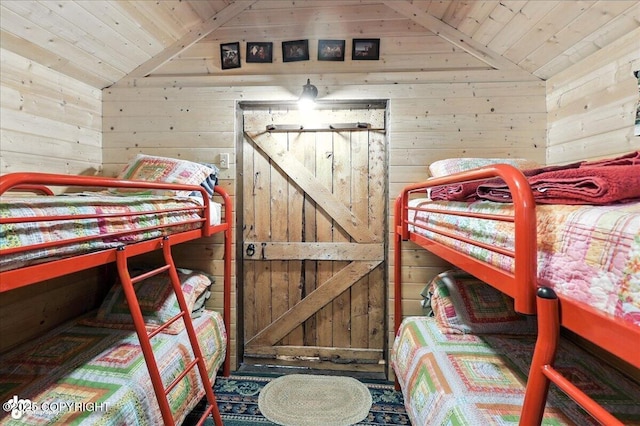 57541 Clam Diggers Ave, Clam Gulch, AK 99568 - bedroom featuring lofted ceiling, wooden ceiling, and wooden walls